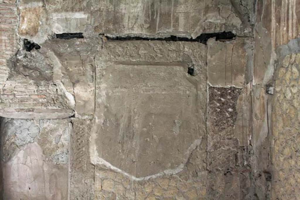VI.12, Herculaneum. February 2007. Blocked doorway in south wall of shop-room. Photo courtesy of Nicolas Monteix.